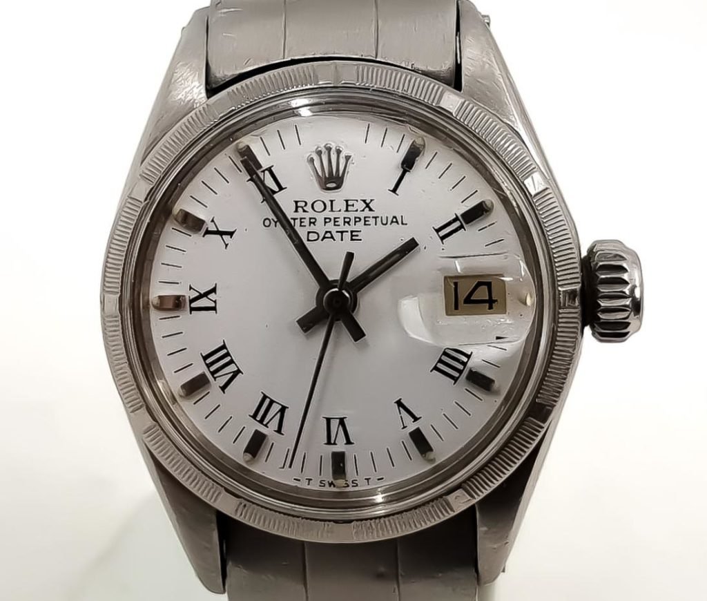 rolex oyster perpetual day date roman numerals
